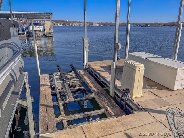 dock area featuring a water view