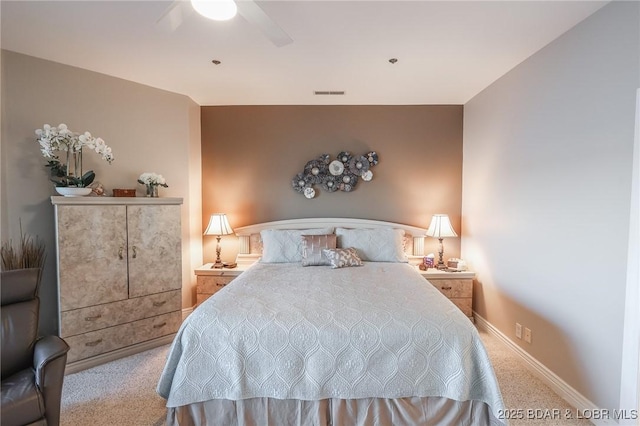 carpeted bedroom featuring ceiling fan