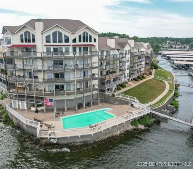 view of building exterior with a water view