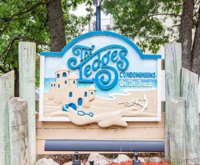 view of community sign