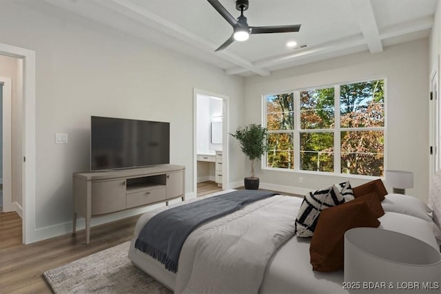 bedroom with connected bathroom, coffered ceiling, beam ceiling, and light wood-type flooring