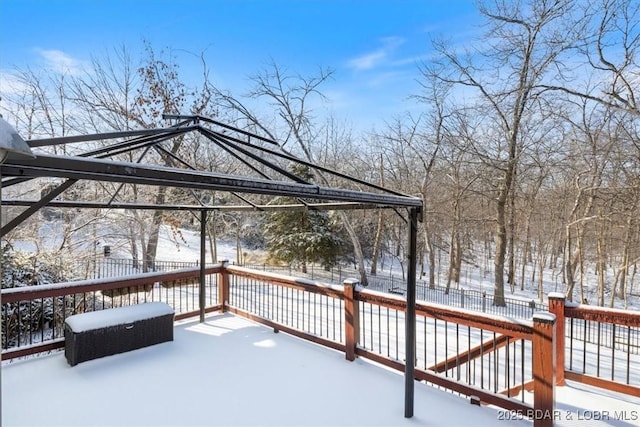 view of snow covered deck