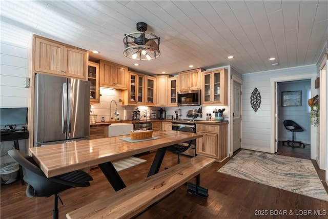 kitchen featuring stainless steel appliances, wood ceiling, dark hardwood / wood-style floors, and sink