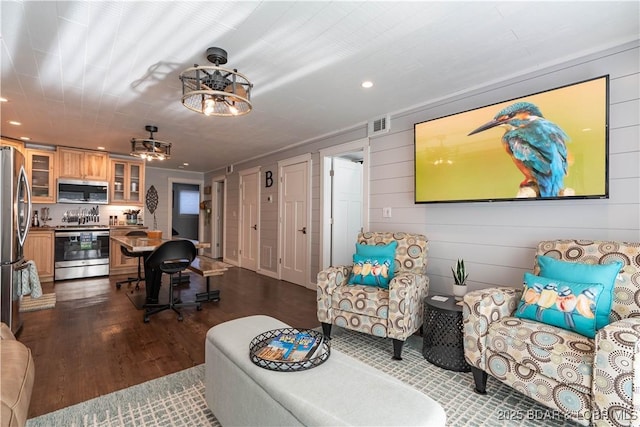 living room with dark wood-type flooring