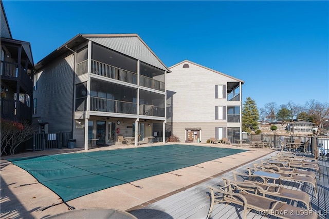 view of swimming pool featuring a patio area