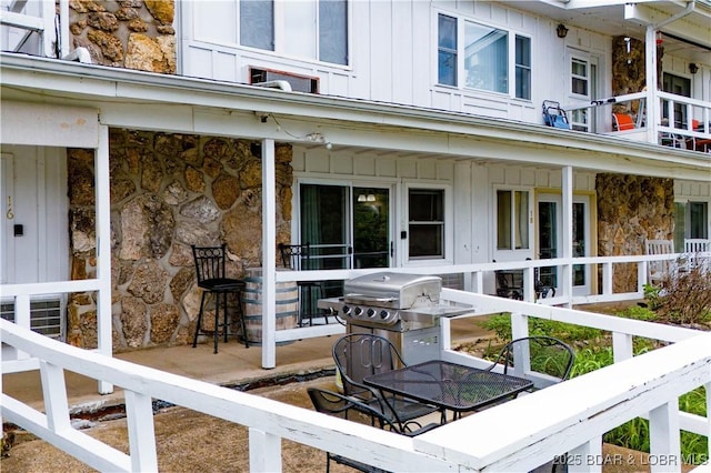 wooden terrace with grilling area