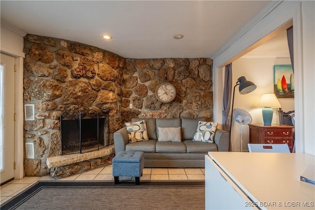 tiled living room with a fireplace and crown molding