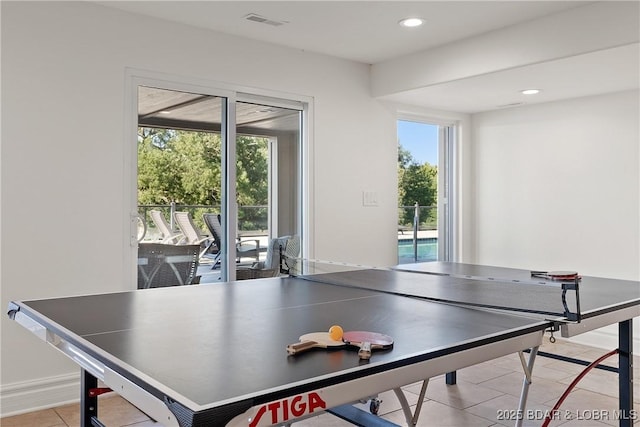 recreation room featuring light tile patterned flooring