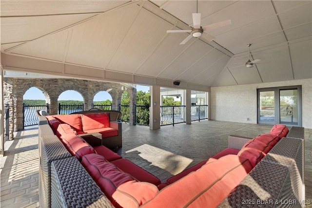 exterior space featuring ceiling fan and an outdoor hangout area