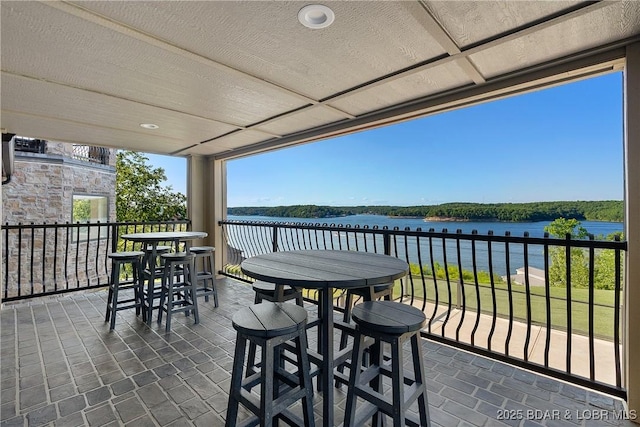 view of patio / terrace with a water view