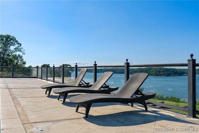 view of patio / terrace featuring a water view