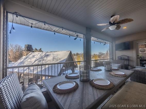 wooden terrace with ceiling fan