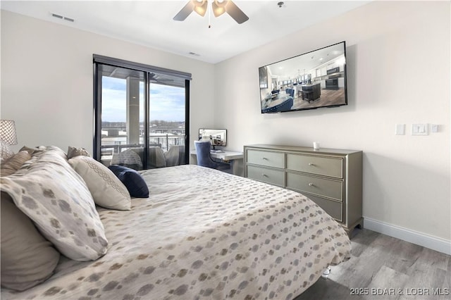 bedroom with access to exterior, ceiling fan, and light hardwood / wood-style floors