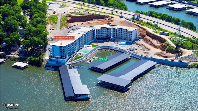 birds eye view of property featuring a water view