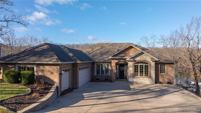 ranch-style house featuring a garage