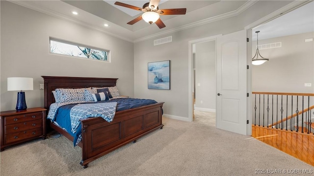 bedroom featuring ceiling fan, crown molding, and light colored carpet