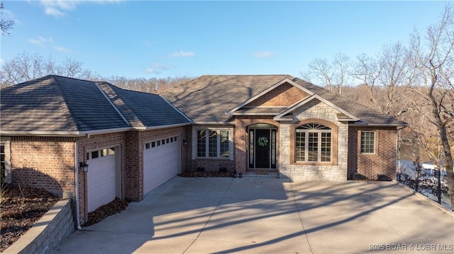 ranch-style house featuring a garage