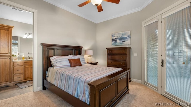 bedroom featuring access to exterior, light colored carpet, ceiling fan, and ensuite bathroom