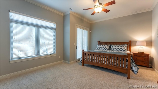 carpeted bedroom featuring multiple windows, ceiling fan, and crown molding