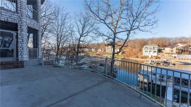 view of patio featuring a water view