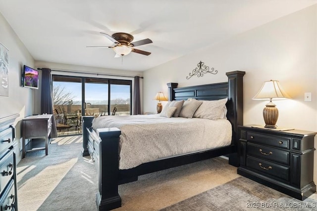 carpeted bedroom with access to exterior and ceiling fan