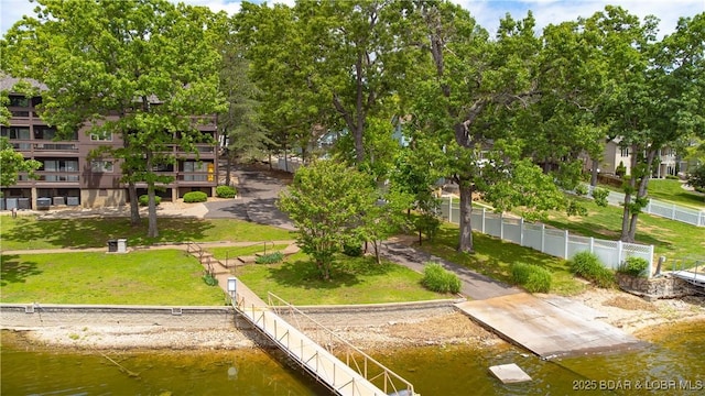 view of community with a water view