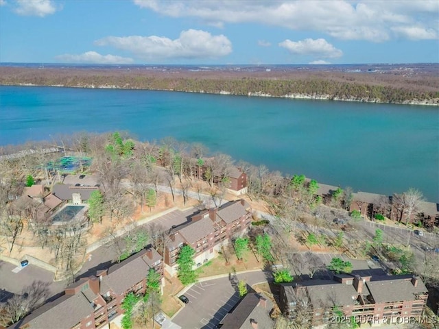 drone / aerial view with a water view