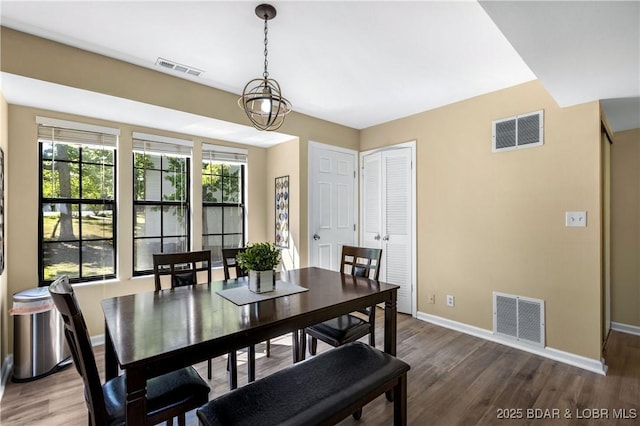 dining room featuring hardwood / wood-style flooring