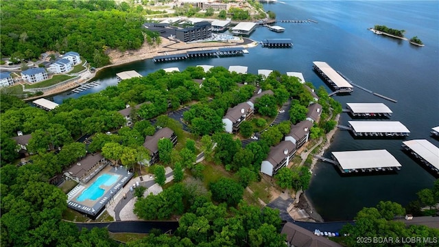 bird's eye view with a water view