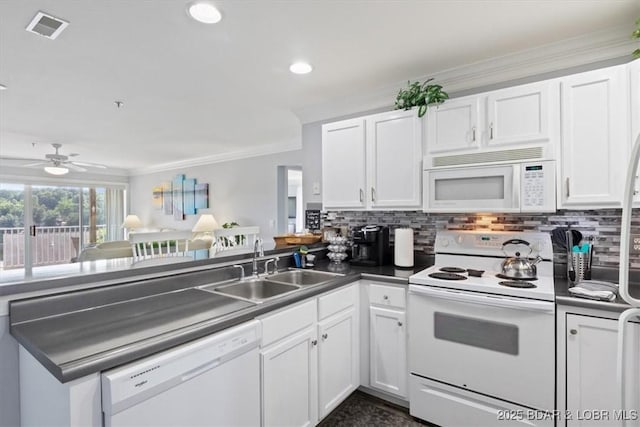 kitchen with white cabinets, ceiling fan, white appliances, and sink