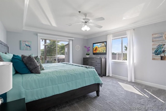 carpeted bedroom featuring ceiling fan and crown molding