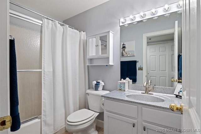 full bathroom with shower / bathtub combination with curtain, vanity, and toilet