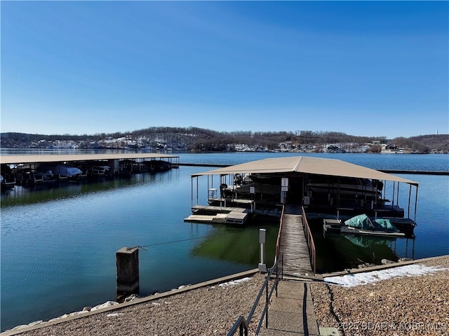 2500 Bay Point Ln Unit 234, Osage Beach, MO 65065 - dock area with a water view and boat lift