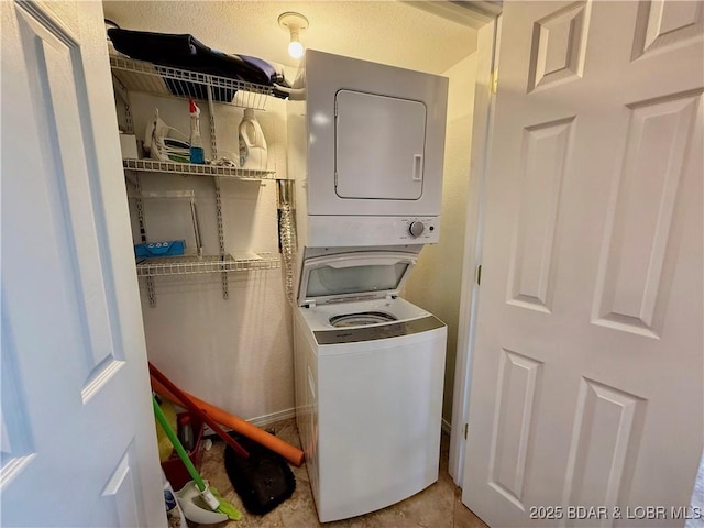 2500 Bay Point Ln Unit 234, Osage Beach, MO 65065 - laundry area featuring laundry area and stacked washing maching and dryer