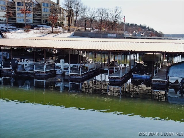 2500 Bay Point Ln Unit 234, Osage Beach, MO 65065 - view of dock featuring a water view and boat lift