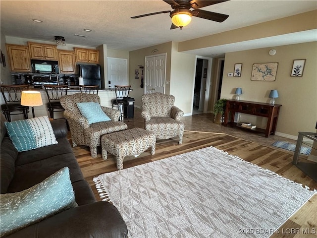 2500 Bay Point Ln Unit 234, Osage Beach, MO 65065 - living room with a ceiling fan, recessed lighting, baseboards, and light wood-type flooring