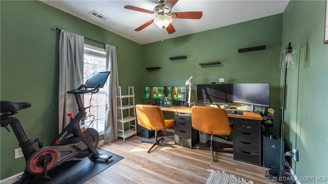 office with ceiling fan and light wood-type flooring