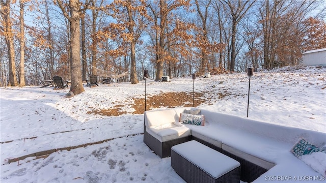 view of yard layered in snow