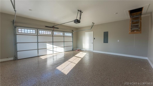 garage featuring electric panel and a garage door opener