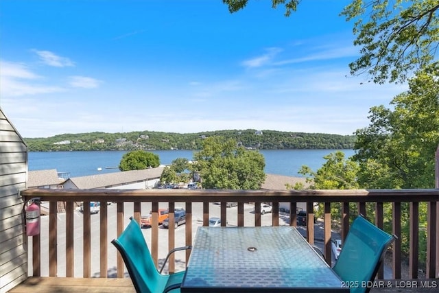 deck featuring a water view