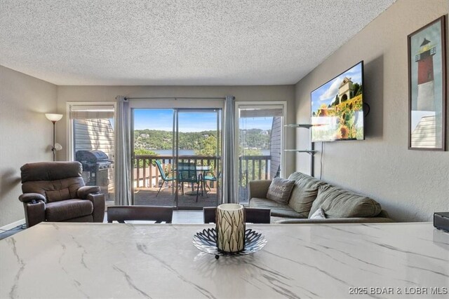 living room with a textured ceiling