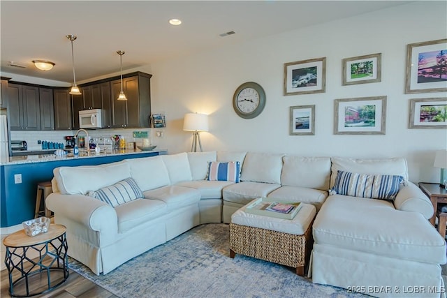 living room featuring light hardwood / wood-style floors