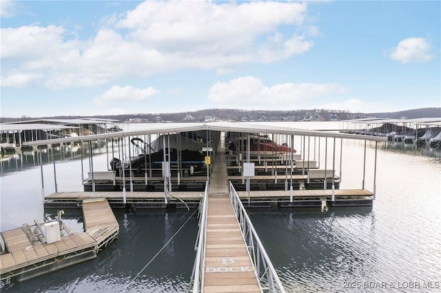 view of dock with a water view