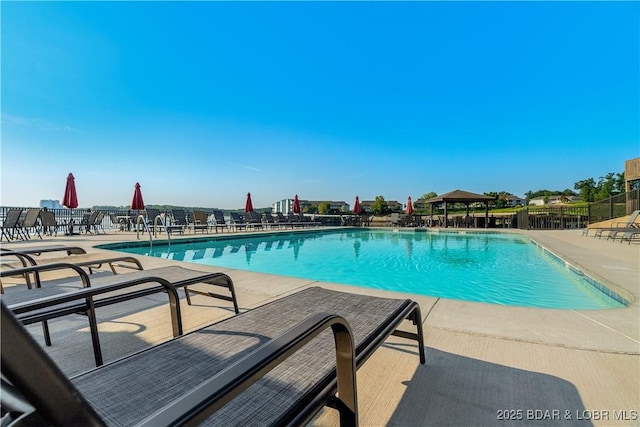 view of pool with a gazebo and a patio area