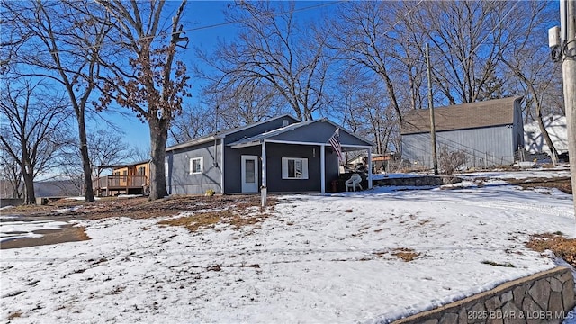 view of front of property featuring a deck