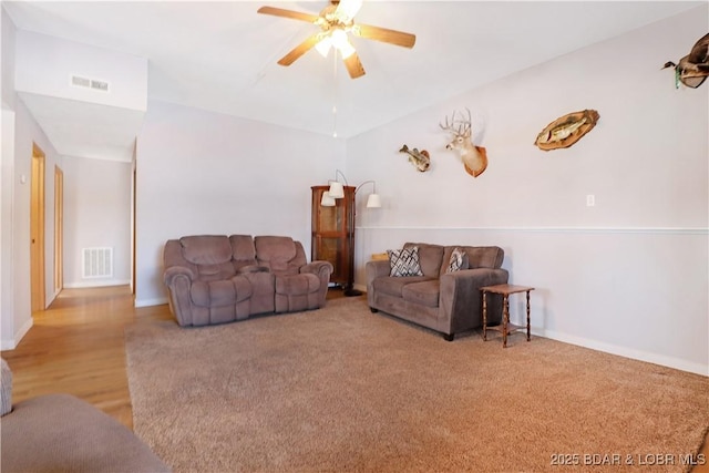 living room featuring ceiling fan