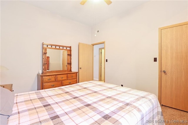 carpeted bedroom featuring ceiling fan