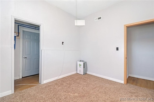 interior space featuring light colored carpet