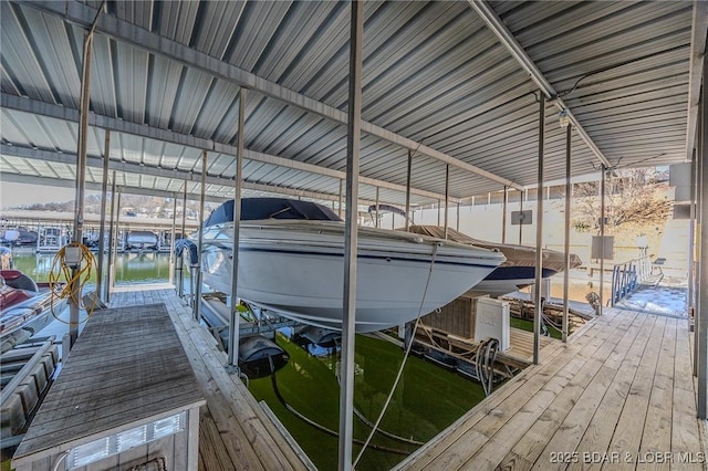 dock area with a water view