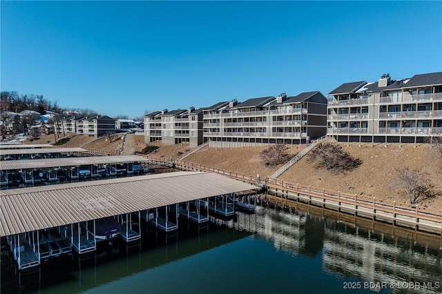 dock area with a water view